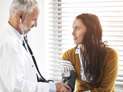 male doctor with female patient
